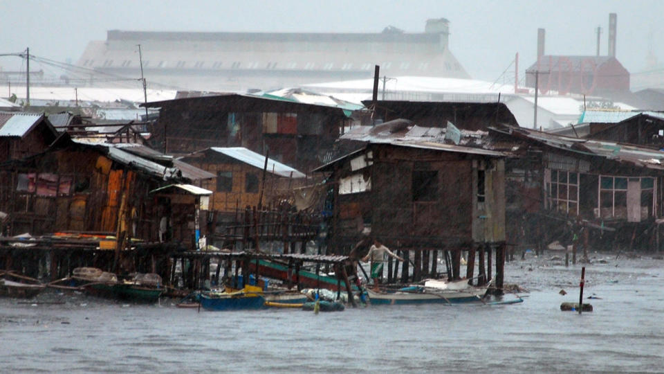 Super Typhoon Haiyan has lashed the Philippines, killing at least three people.