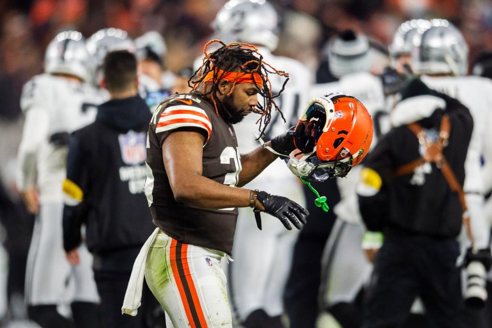 Browns cornerback M.J. Stewart (36) walks off the field as the Raiders celebrate after beating the Browns on a last-second field goal in Cleveland, Dec. 20, 2021.