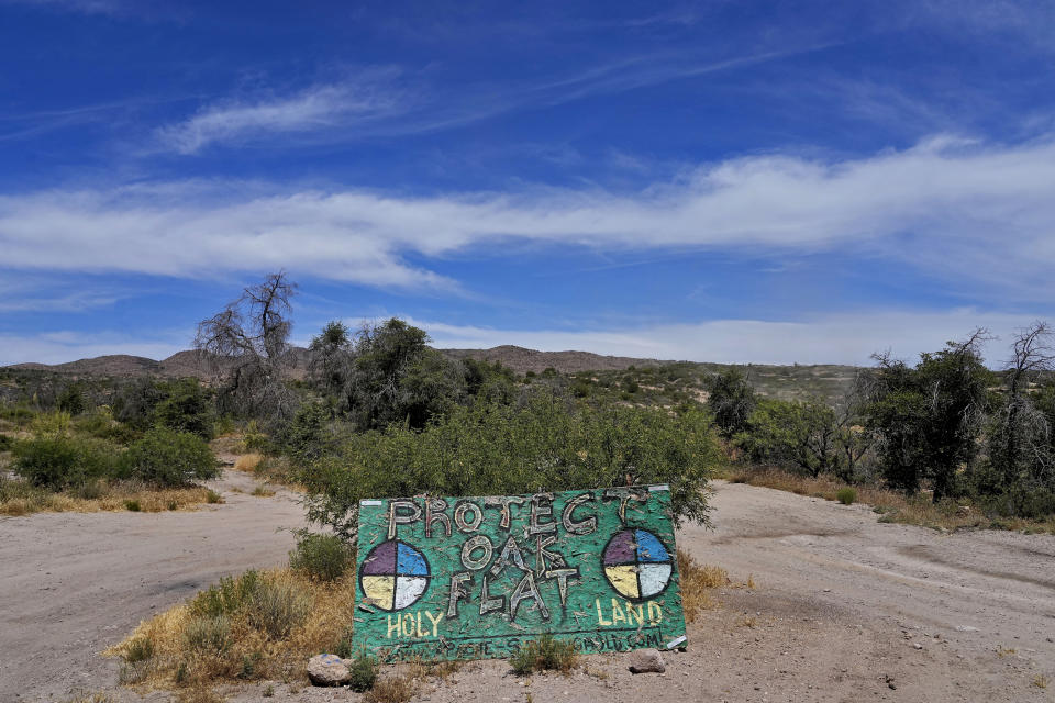 A lone sign at the entrance of Oak Flat Campground in the Tonto National Forrest seeks to protect the campground from mining, Friday, June 9, 2023, in Miami, Ariz. Amid strong opposition to the project by some tribes and others, the Forest Service withdrew Resolution's original environmental impact statement for Oak Flat two years ago for additional consultations. No time frame has been announced. But once a new review is published, the formal transfer process can begin unless a federal court halts it. (AP Photo/Matt York)