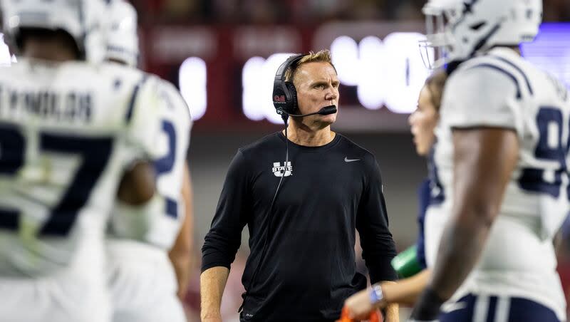 Utah State head coach Blake Anderson checks a call during a game against Alabama, Saturday, Sept. 3, 2022, in Tuscaloosa, Ala.