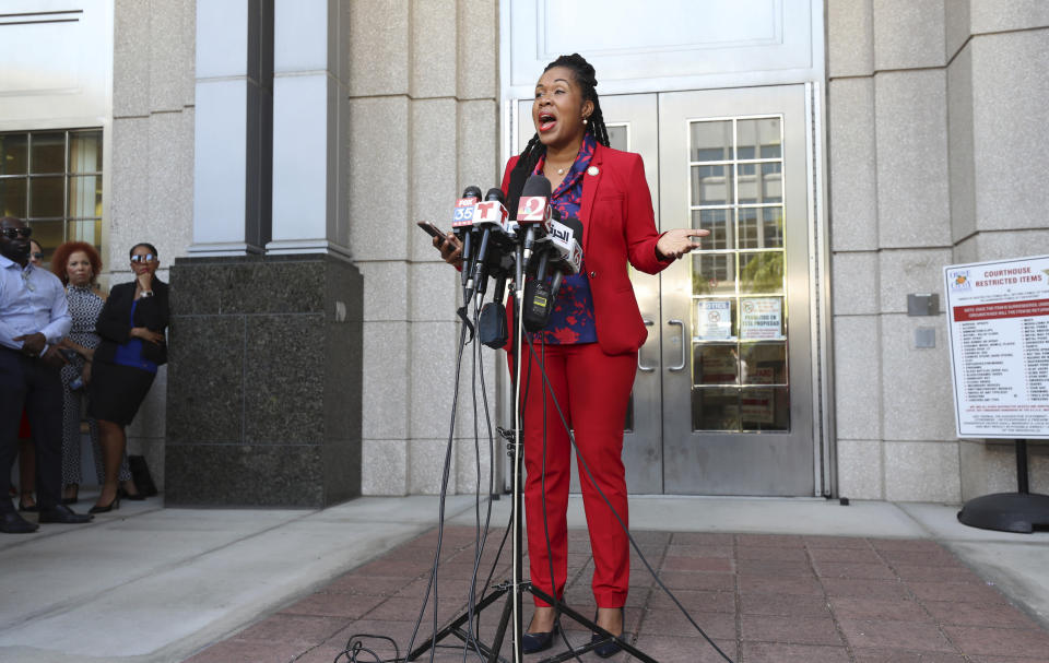 FILE - Attorney Monique Worrell, of the 9th Judicial Circuit, speaks during a news conference, Aug. 9, 2023, outside her former office in the Orange County Courthouse complex in Orlando, Fla. Gov. Ron DeSantis exceeded his authority when he removed Worrell from her elected office after a teenager fatally shot a girl and a news reporter, her attorney told the Supreme Court on Wednesday, Dec. 6. (Ricardo Ramirez Buxeda/Orlando Sentinel via AP, File)