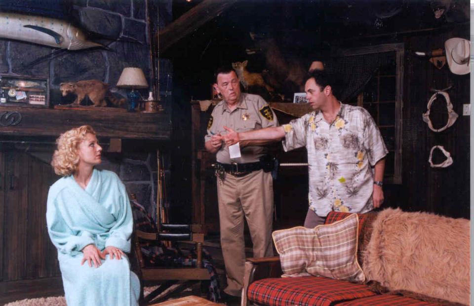 A scene from Florida Studio Theatre’s 2000 production of the comedy mystery “Smoke and Mirrors,” which will be presented in the 2022 summer season.