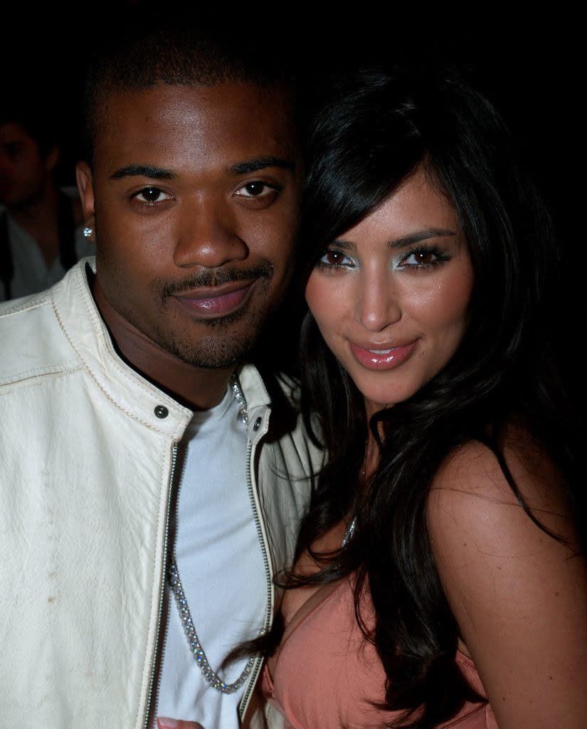 closeup of Ray J and Kim smiling