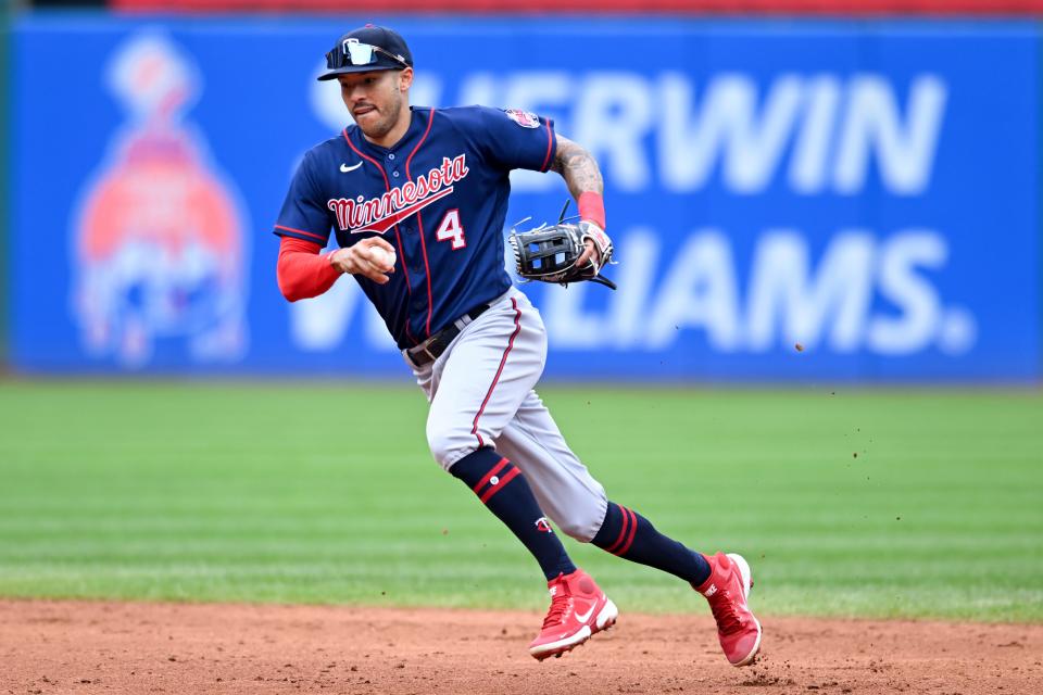 Carlos Correa of ​​the Minnesota Twins fields a ground ball hit by Oscar Gonzalez of the Cleveland Guardians in the third inning of a baseball game in Cleveland on Monday, Sept. 19, 2022.