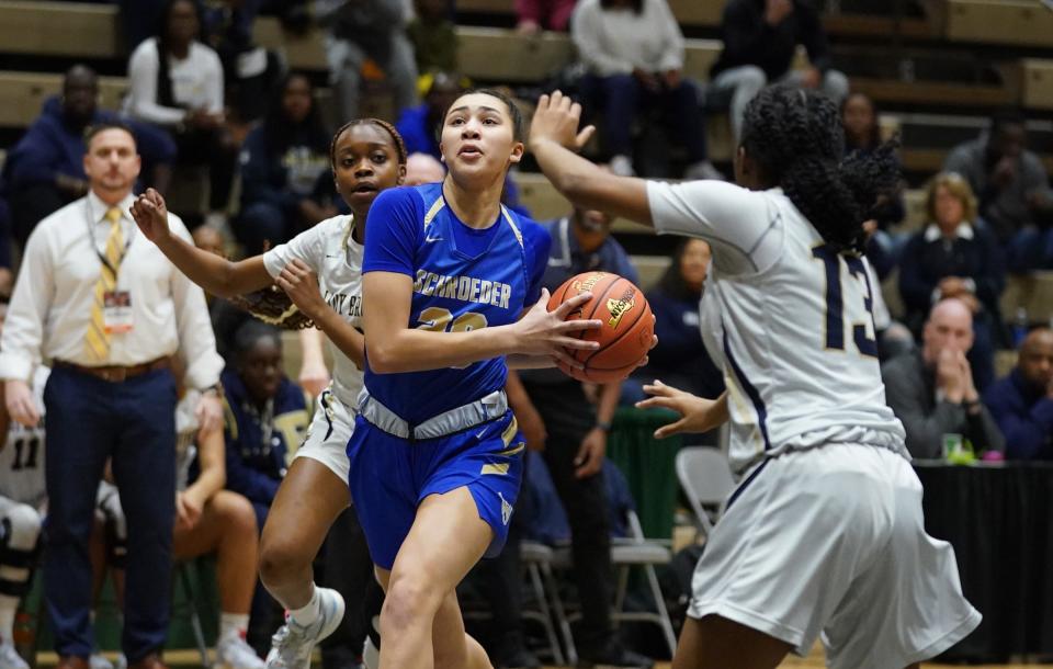 Webster-Schroeder's Mariah Watkins (20) in action in the girls Class AA state semifinal game against Baldwin at Hudson Valley Community College in Troy, on Friday, March 17, 2023.