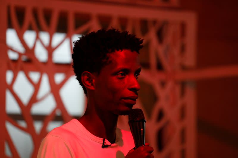 Kenyan standup comedian Brian Onjoro performs during his show at the Kez's Kitchen restaurant in Nairobi