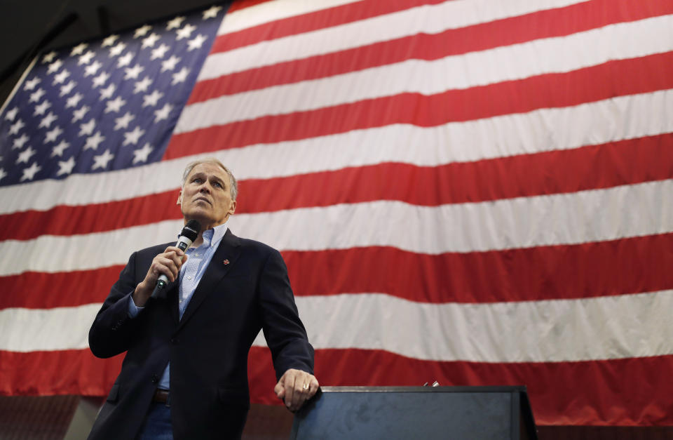 Washington Gov. Jay Inslee speaks at the Battle Born Progress Progressive Summit, Saturday, Jan. 12, 2019, in North Las Vegas, Nev. Inslee pitched his record tackling climate change, gun control measures, raising the minimum wage and expanding paid family leave to Nevada progressive activists in the early presidential nominating state. (AP Photo/John Locher)