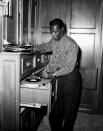 <p>The jazz singer combs through his record collection and picks out a good one for guests in his home. </p>