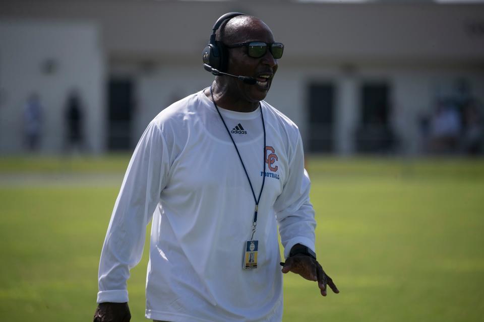 Cape Coral coach Larry Gary instructs his players during their game against Gateway on Monday, Sept. 5, 2022, at Gateway High School. 