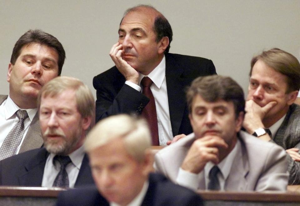 FILE - Russian tycoon Boris Berezovsky, center top, attends a session of the Federation Council, the Russian parliament's upper house, in Moscow, Russia, Wednesday, June 28, 2000. Berezovsky, who became a political opponent of Russian President Vladimir Putin, was found dead in his London home in 2013. The cause of death has never been determined. (AP Photo, File)