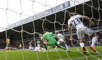 <p>Arsenal’s Alexis Sanchez scores their first goal </p>