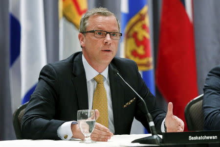 Saskatchewan's Premier Brad Wall speaks during a news conference after the Quebec Summit On Climate Changes at the Hilton hotel in Quebec City, April 14, 2015. REUTERS/Mathieu Belanger