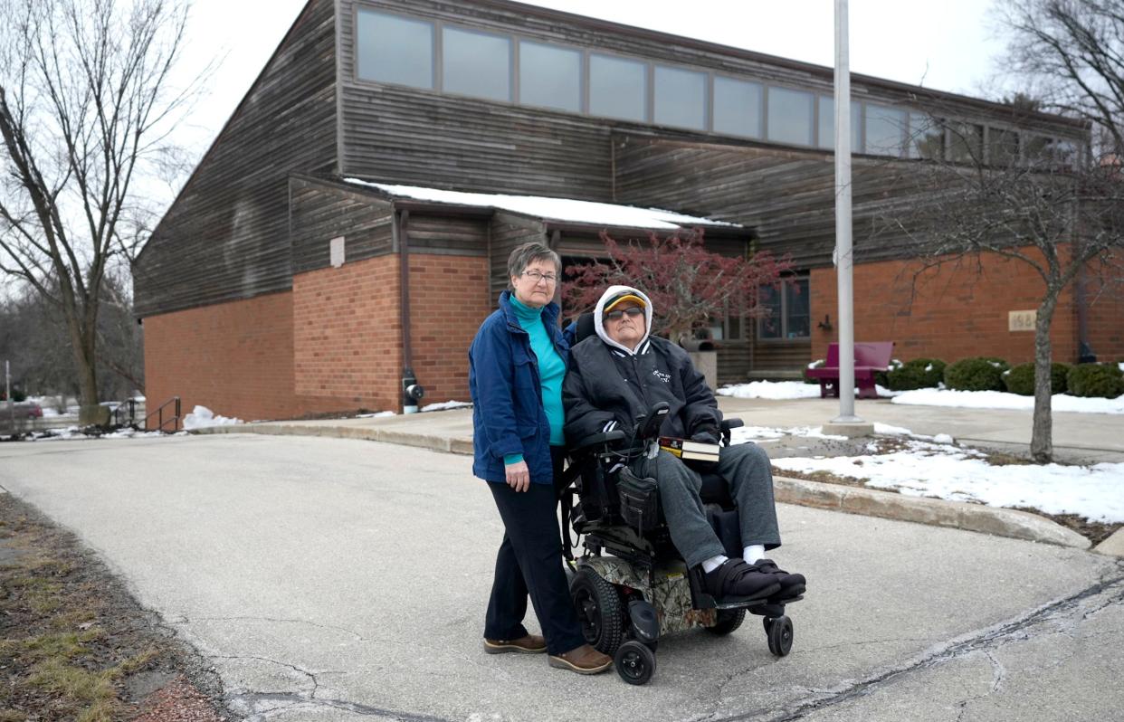 LuAnn Bird and her husband Phil are shown at the Hales Corners Library on South 116th Street in Hales Corners on Thursday, March 16, 2023. LuAnn Bird filed an ADA accessibility complaint against the library.