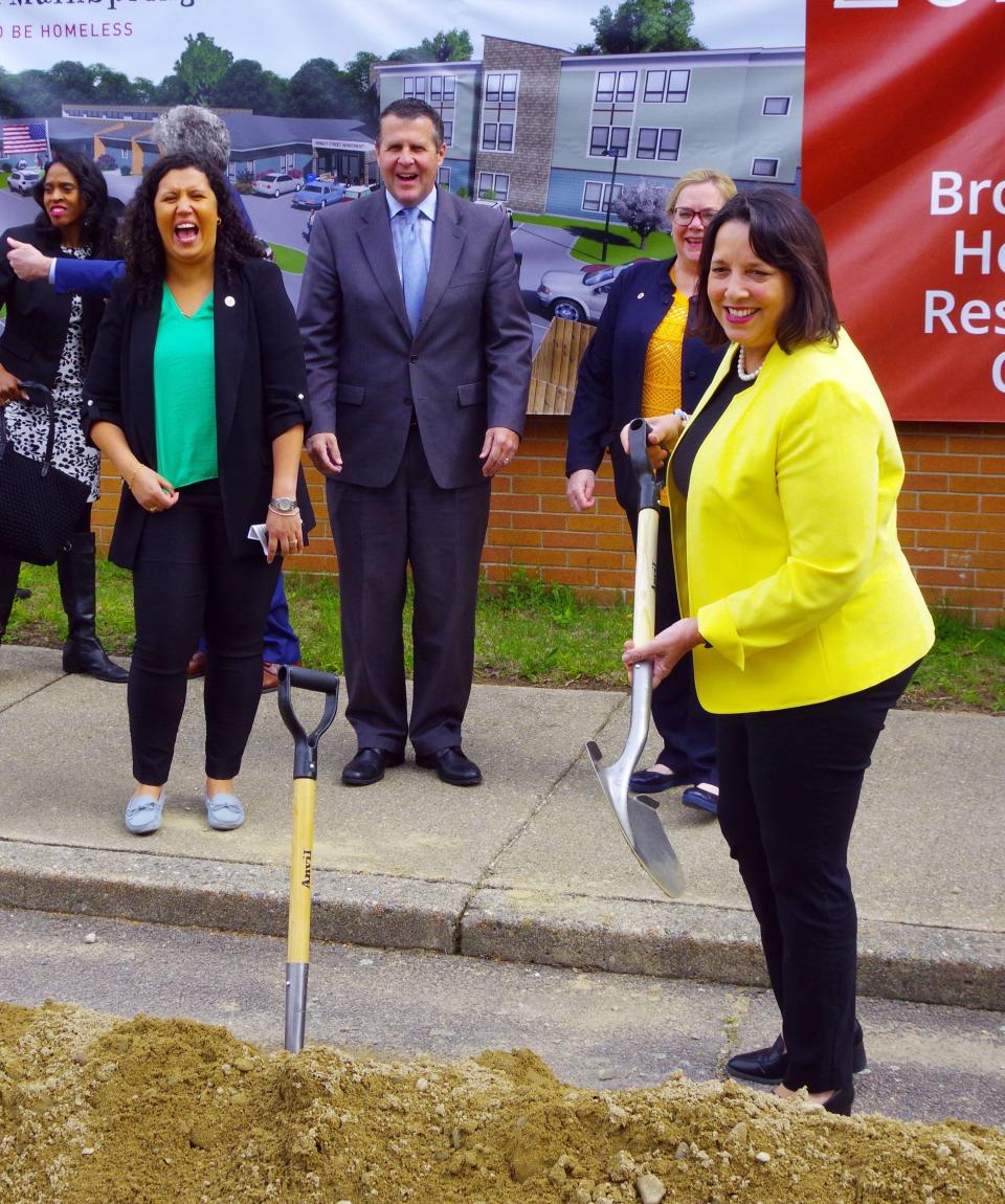 Lt. Governor Kim Driscoll (R) was asked to take up the shovel again for a picture, which got a laugh from Mass. Rep. Rita Mendes (L) and Brockton Mayor Robert Sullivan at the Groundbreaking ceremony at the site of the future Father Bill's Homeless Shelter in Brockton on Wednesday, May 3, 2023.