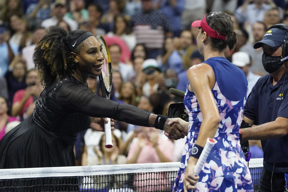 Serena Williams, left, of the United States, shakes hands with Ajla Tomljanovic, of Austrailia, after their match in the third round of the U.S. Open tennis championships, Friday, Sept. 2, 2022, in New York. (AP Photo/John Minchillo)