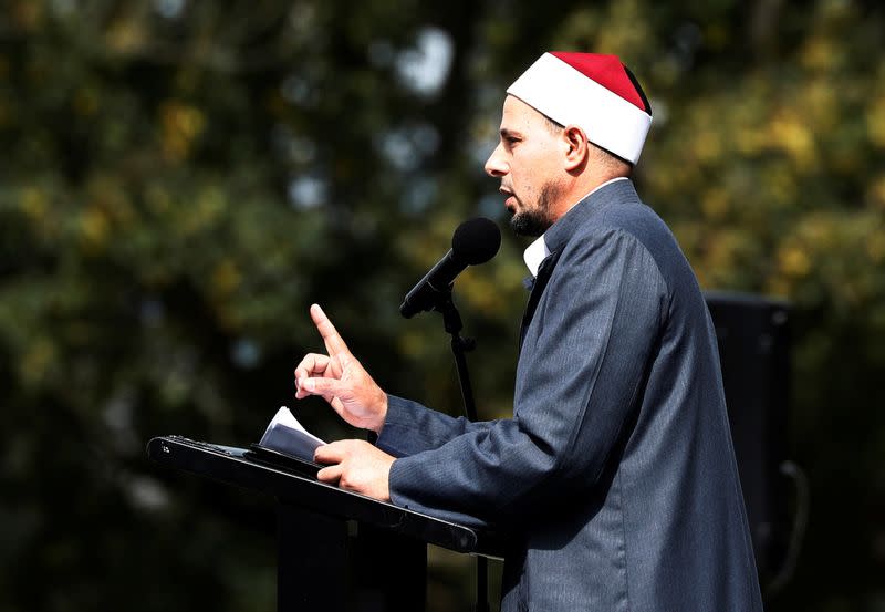 Imam Gamal Fouda leads a Friday prayer at Hagley Park outside Al-Noor mosque in Christchurch, New Zealand