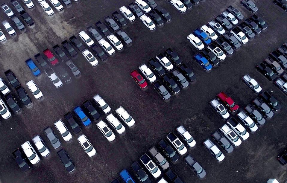 Hundreds of new Ford F-150 pickup trucks sit on a lot of the Department of Public Works rail yard off I-96 near Evergreen in Detroit on April 15, 2021. The trucks are waiting for semiconductors, which have been in limited supply globally because of COVID disruption.