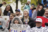 Basaeball fans cheer ahead of a victory parade, Friday, Nov. 5, 2021, in Atlanta. The Braves beat the Houston Astros 7-0 in Game 6 on Tuesday to win their first World Series baseball title in 26 years. (AP Photo/Brynn Anderson)