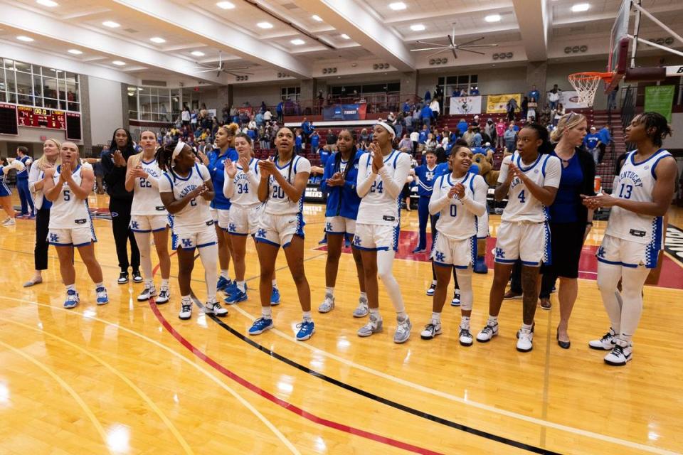 Kentucky players celebrate after defeating East Tennessee State. The game was played at Transylvania’s Clive M. Beck Center because UK’s Memorial Coliseum is undergoing renovations. The Cats will play most of their home games this season in Rupp Arena.