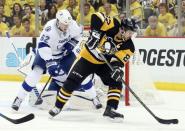 May 26, 2016; Pittsburgh, PA, USA; Pittsburgh Penguins center Sidney Crosby (87) attempts a back-hand shot Tampa Bay Lightning defenseman Andrej Sustr (62) defends during the first period in game seven of the Eastern Conference Final of the 2016 Stanley Cup Playoffs at the CONSOL Energy Center. Mandatory Credit: Charles LeClaire-USA TODAY Sports / Reuters Picture Supplied by Action Images