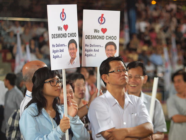 Front row supporters stood as they watched the speakers addressing the crowd from the podium. (Yahoo! Singapore/ Alvin Ho)