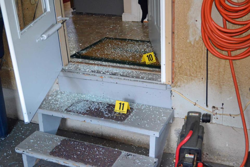 Broken glass from the interior garage door where Israel Keyes broke into the Currier's home in Vermont. / Credit: Essex Police Department