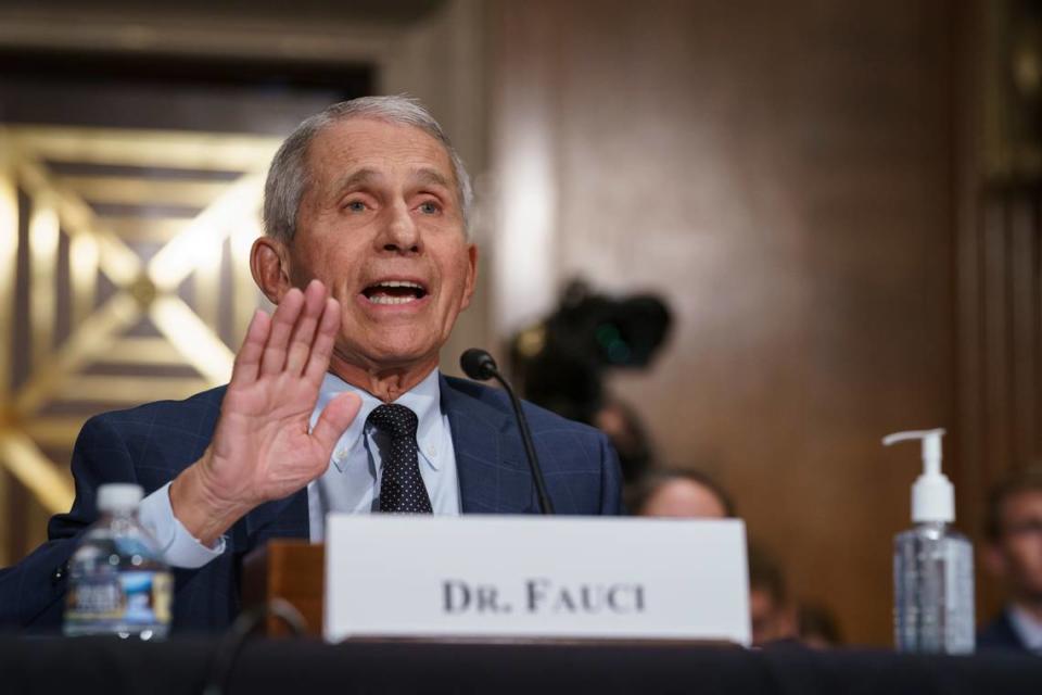 Top infectious disease expert Dr. Anthony Fauci pushes back on statements by Sen. Rand Paul, R-Ky., as he testifies before the Senate Health, Education, Labor, and Pensions Committee on Capitol Hill in Washington, Tuesday, July 20, 2021. Cases of COVID-19 have tripled over the past three weeks, and hospitalizations and deaths are rising among unvaccinated people. (AP Photo/J. Scott Applewhite, Pool)