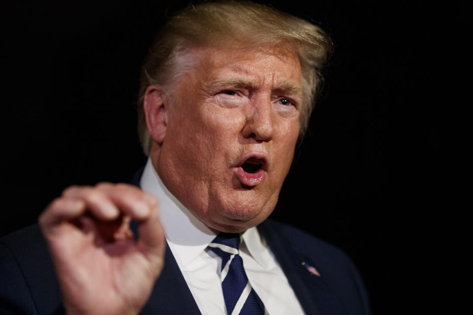 President Donald Trump speaks with reporters as he walks to Marine One on the South Lawn of the White House, Friday, Aug. 23, 2019, in Washington. Trump is en route to the G-7 summit in France. (AP Photo/Alex Brandon)