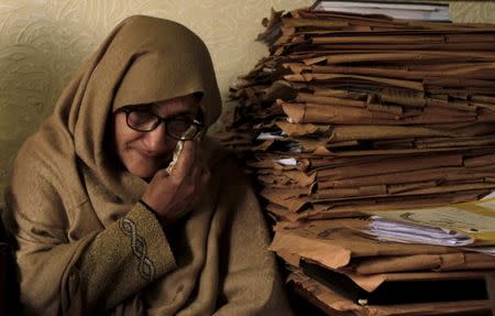 Sajida Parveen, the mother of Ehsan Azeem, who was sentenced to death by a military court, reacts during an interview with Reuters in Rawalpindi January 23, 2015. REUTERS/Faisal Mahmood