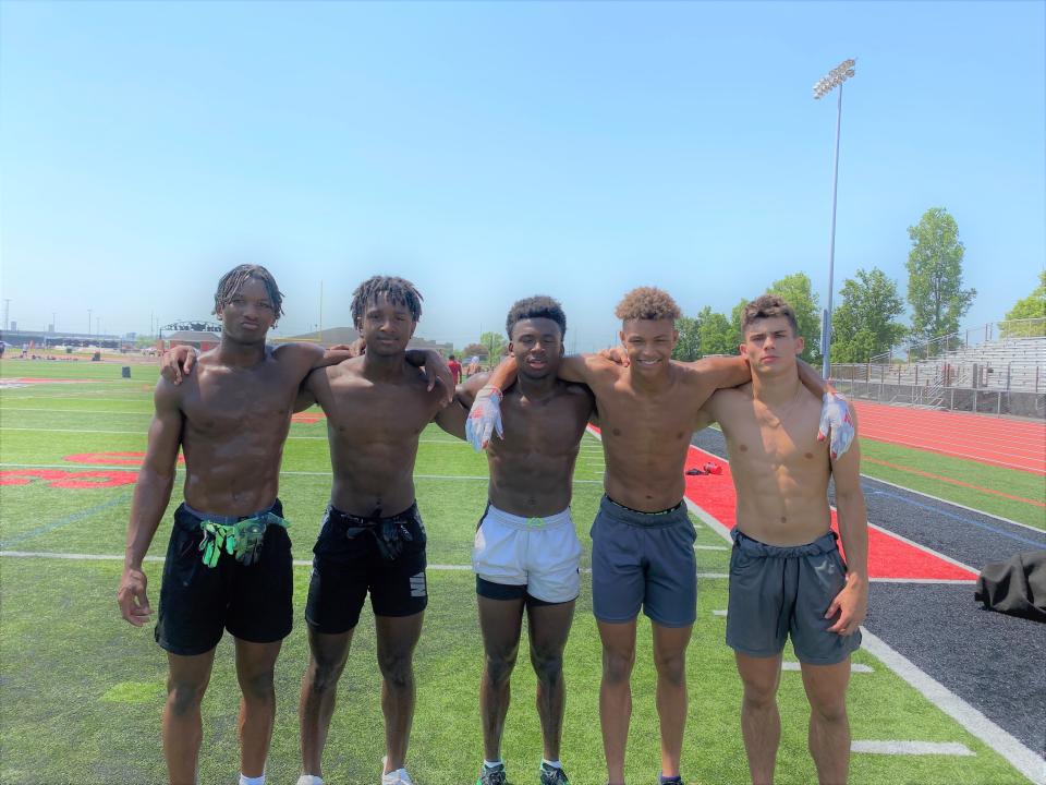 Lakota West has a defensive backfield with five Division I offers. They are, from left, juniors Taebron Bennie-Powell and Bukari Miles, seniors Josh Fussel, Malik Hartford and Ben Minich.