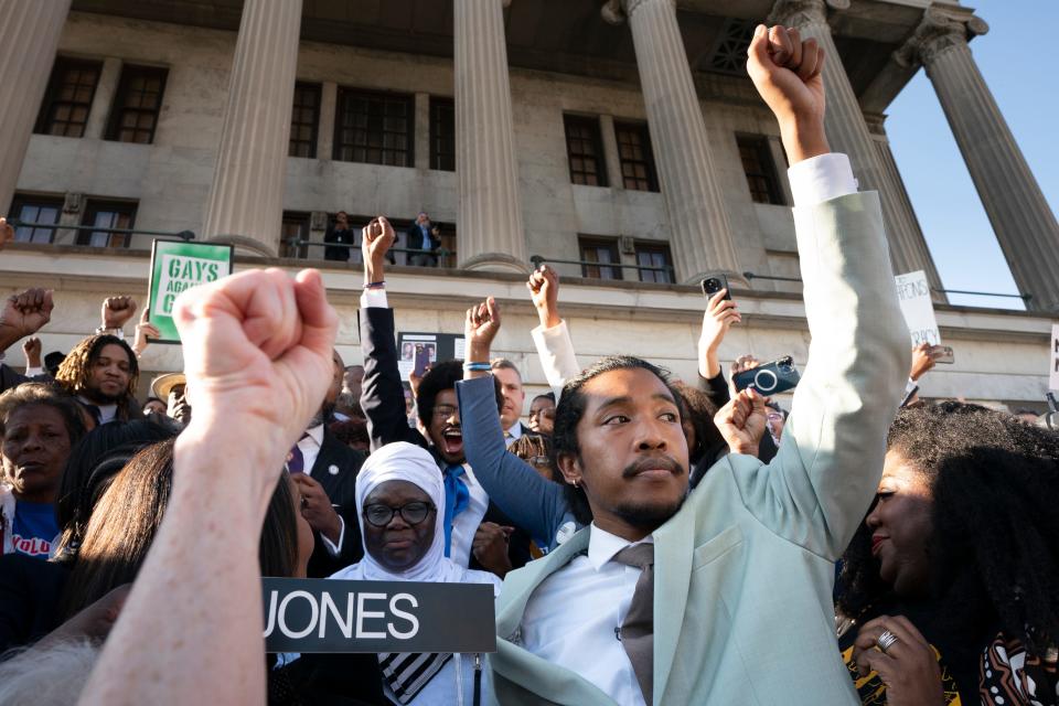 State Rep. Justin Jones, D-Nashville, raises his fist to the crowd after taking the oath of office on the steps of the state Capitol in Nashville. Jones, who was expelled last week from the GOP-led Tennessee House over his role in a gun-control protest on the House floor, was reinstated April 10 after Nashville’s governing council voted to send him straight back to the Legislature.