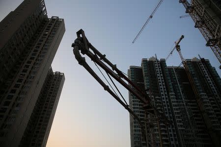 Residential buildings under construction are seen in Zhongshan, Guangdong province, China February 16, 2017. Picture taken February 16, 2017. Wu Jin/Southern Metropolis Daily via REUTERS