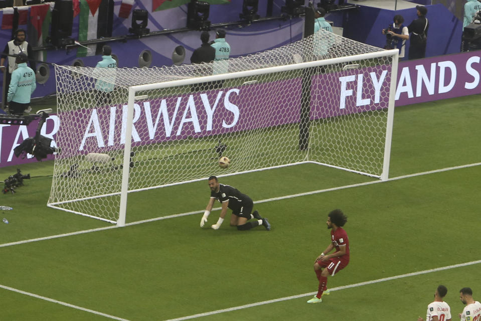 Qatar's Akram Afif scores a goal during the Asian Cup final soccer match between Qatar and Jordan at the Lusail Stadium in Lusail, Qatar, Saturday, Feb. 10, 2024. (AP Photo/Hussein Sayed)