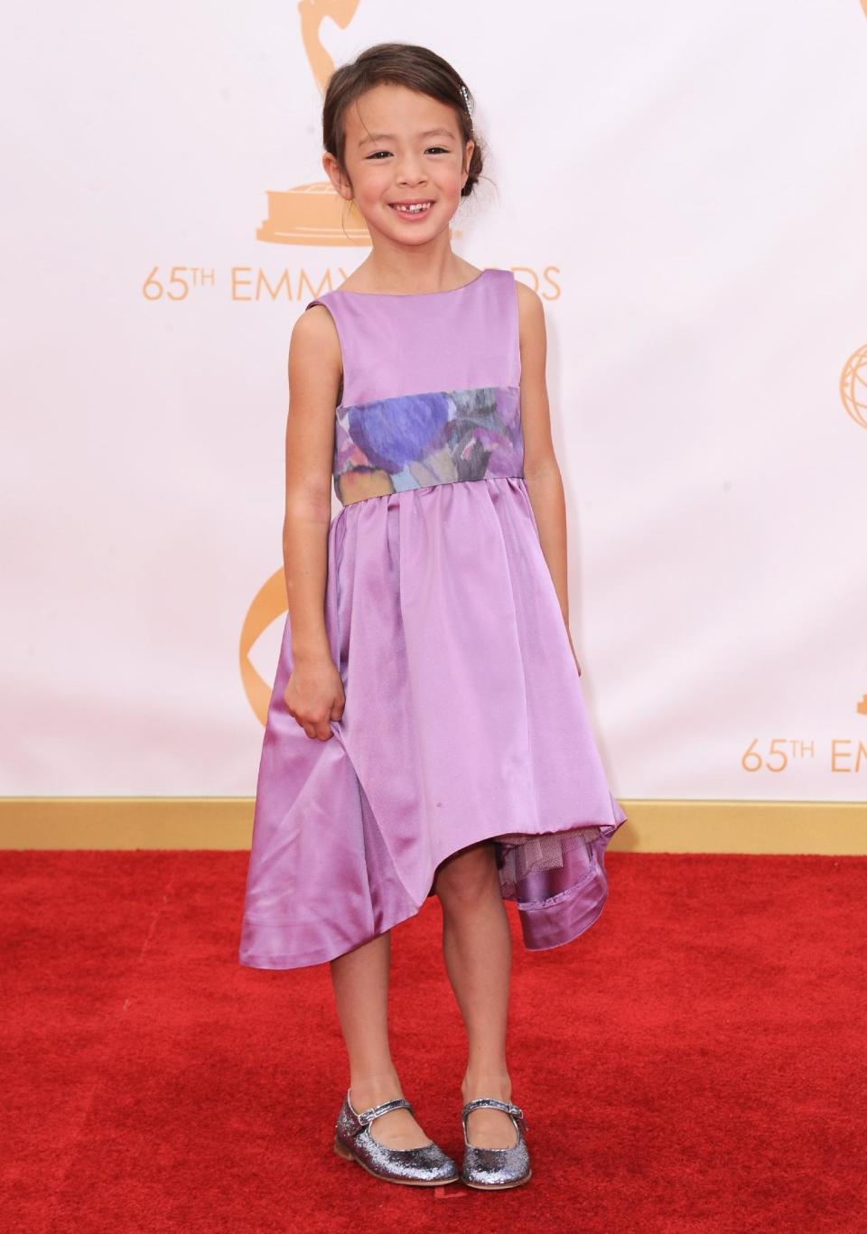 Aubrey Anderson-Emmons arrives at the 65th Primetime Emmy Awards at Nokia Theatre on Sunday, Sept. 22, 2013, in Los Angeles. (Photo by Jordan Strauss/Invision/AP)