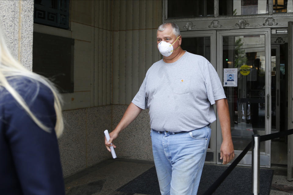 FILE - In this Tuesday, July 21, 2020, file photo, Ohio House Speaker Larry Householder leaves the federal courthouse after an initial hearing following charges against him and four others alleging a $60 million bribery scheme, in Columbus, Ohio. (AP Photo/Jay LaPrete, File)