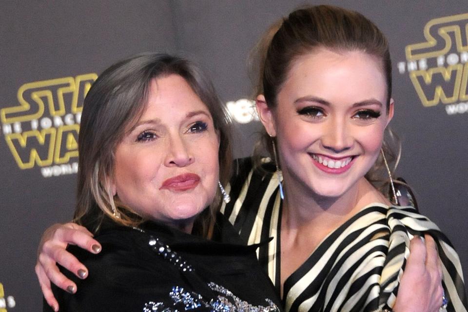 Actress Carrie Fisher and daughter actress Billie Lourd attend the Premiere of Walt Disney Pictures and Lucasfilm's 'Star Wars: The Force Awakens' on December 14, 2015 in Hollywood, California.