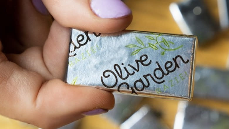 Holding an Olive Garden mint 