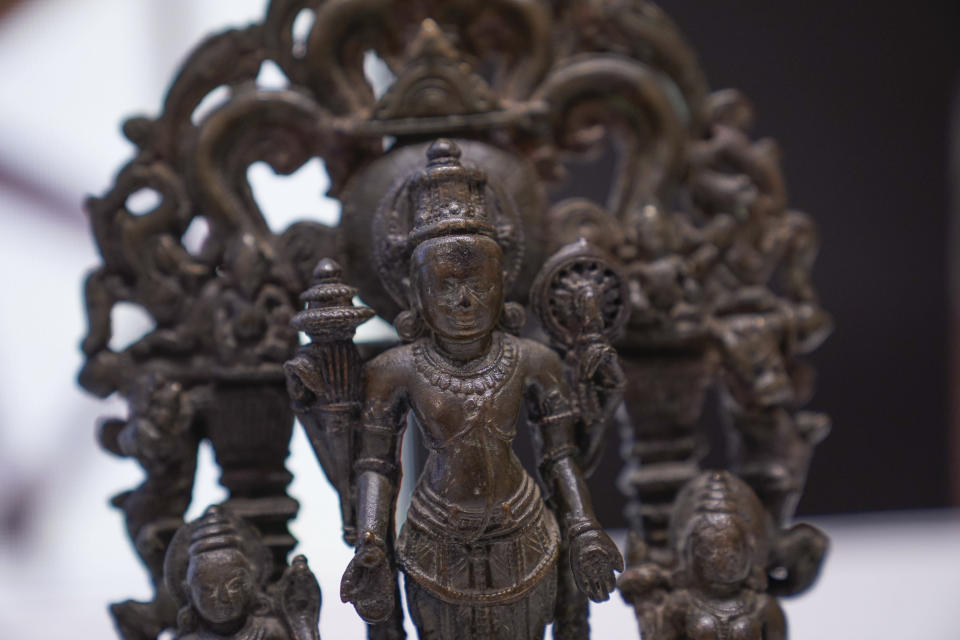 Some of the stolen objects being returned to India are displayed during a ceremony at the Indian consulate in New York, Thursday, Oct. 28, 2021. U.S. authorities have returned about 250 antiquities to India in a long-running investigation of a stolen art scheme. The items, worth an estimated $15 million, were handed over on Thursday during a ceremony at the Indian consulate in New York City. (AP Photo/Seth Wenig)