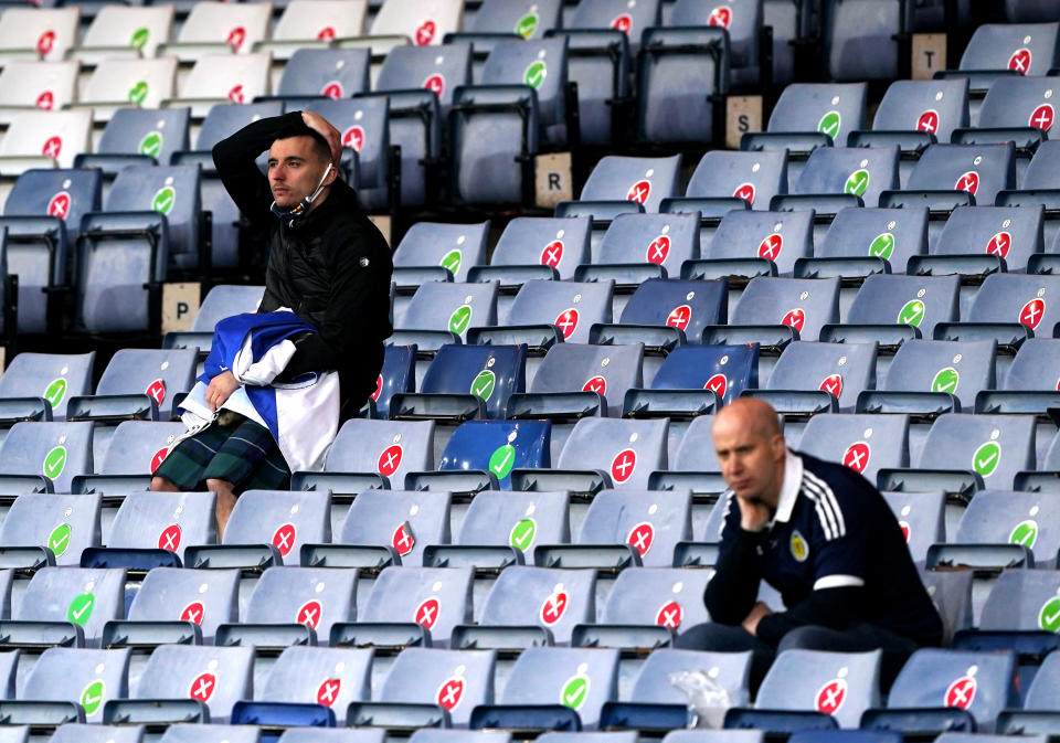 Scotland fans looks dejected after the UEFA Euro 2020 Group D match at Hampden Park, Glasgow