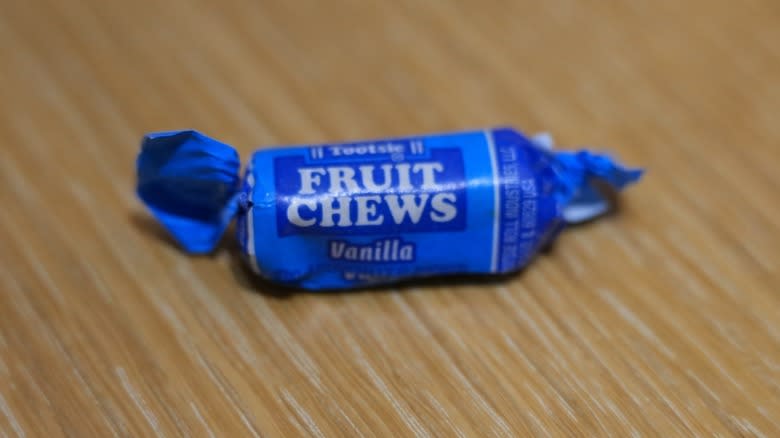 Vanilla Tootsie Roll in blue wrapper