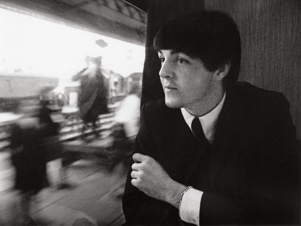 During the filming of ‘A Hard Day’s Night’ on a train leaving Paddington station in 1964 (Harry Benson)