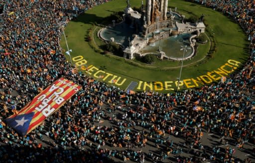 Rallying under the slogan "Objective Independence", thousands gathered in Barcelona's Plaza Espana, among them families with children, young people and pensioners