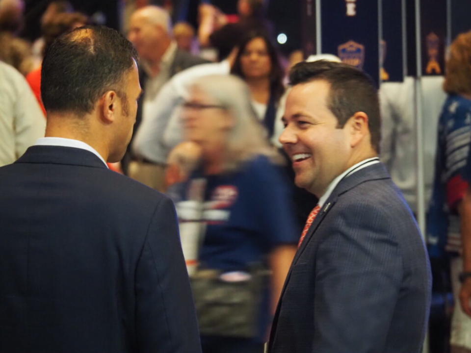  <em>Lieutenant governor candidate Micah Beckwith chats with Republicans at the Indiana GOP’s convention on Saturday, June 15, 2024. (Leslie Bonilla Muñiz/Indiana Capital Chronicle)</em>