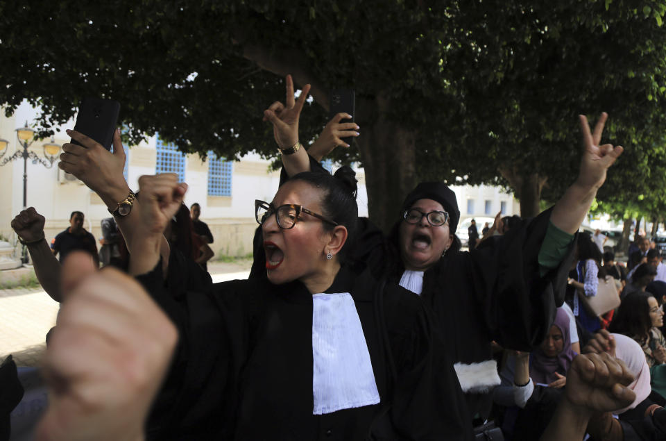 Tunisian lawyers take part in a protest against the recent arrests of their colleagues, in Tunis, Tunisia, Thursday, May 16, 2024. (AP Photo/Anis Mili)