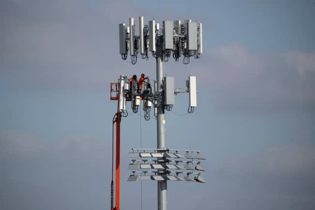 A system used in the United States that helps increase competition and keep wireless prices down involves allowing smaller service providers to buy wholesale access to the cellphone networks owned by larger companies.