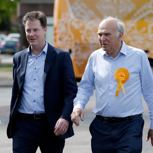 Britain's Liberal Democrat leader Nick Clegg campaigns with local candidate Vince Cable in Twickenham<br>Britain's Liberal Democrat leader Nick Clegg (L) campaigns with local candidate Vince Cable in Twickenham, London, Britain May 4, 2015. Britain will go to the polls in a national election on May 7. REUTERS/Peter Nicholls