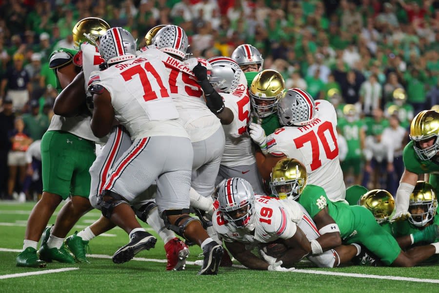 SOUTH BEND, INDIANA – SEPTEMBER 23: Chip Trayanum #19 of the Ohio State Buckeyes scores a touchdown against the Notre Dame Fighting Irish during the fourth quarter at Notre Dame Stadium on September 23, 2023 in South Bend, Indiana. (Photo by Michael Reaves/Getty Images)