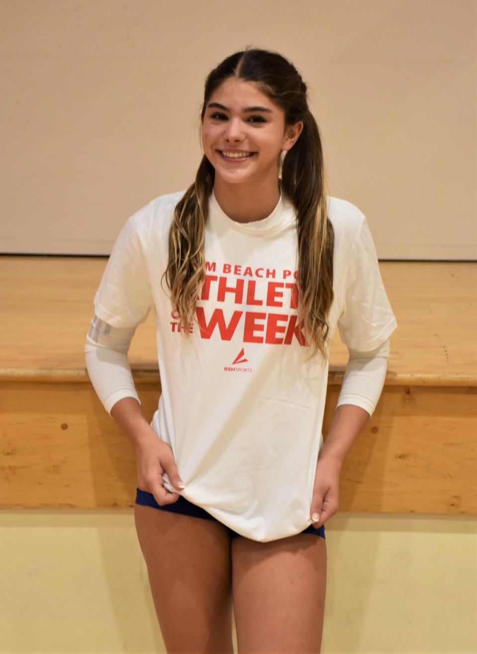 Cardinal Newman's Ava Castro poses with her Athlete of the Week shirt