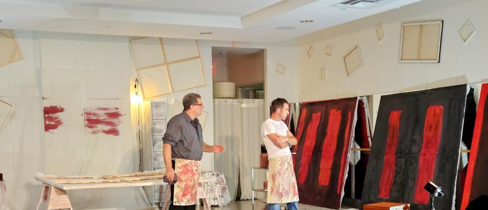 Lee Gundersheimer, left, as artist Mark Rothko, instructs his assistant, Ken, played by Alex Teicheira, how to observe and study a painting in John Logan’s “Red.”