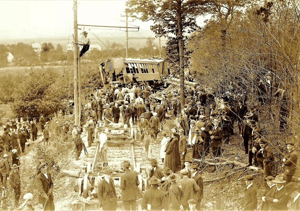 In the foreground you can see the remains of the three trolley cars of the CG&W Electric Street Railway that crashed coming down the mountain from Pen Mar on May 22, 1920. General
Manager Robert D. Sefton was severely injured while trying to apply the manual hand brakes on one of the work cars. Sefton died from his injuries early the next morning.